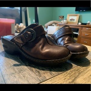 Brown buckle clogs
